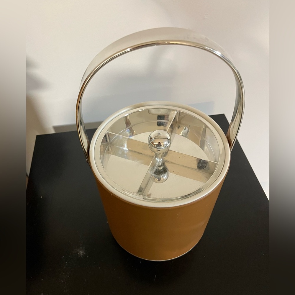 ***😀3 for $35./Tan, silver & white ice bucket with a carrying handle.